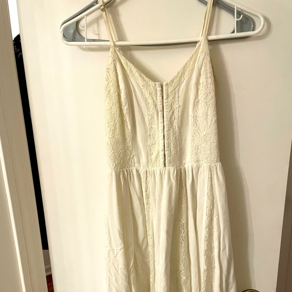 White cinch topped dress by Bethany Mota